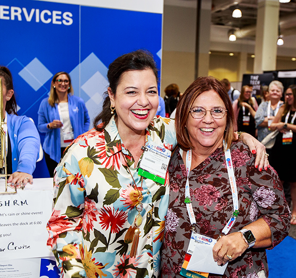 two women conference attendees